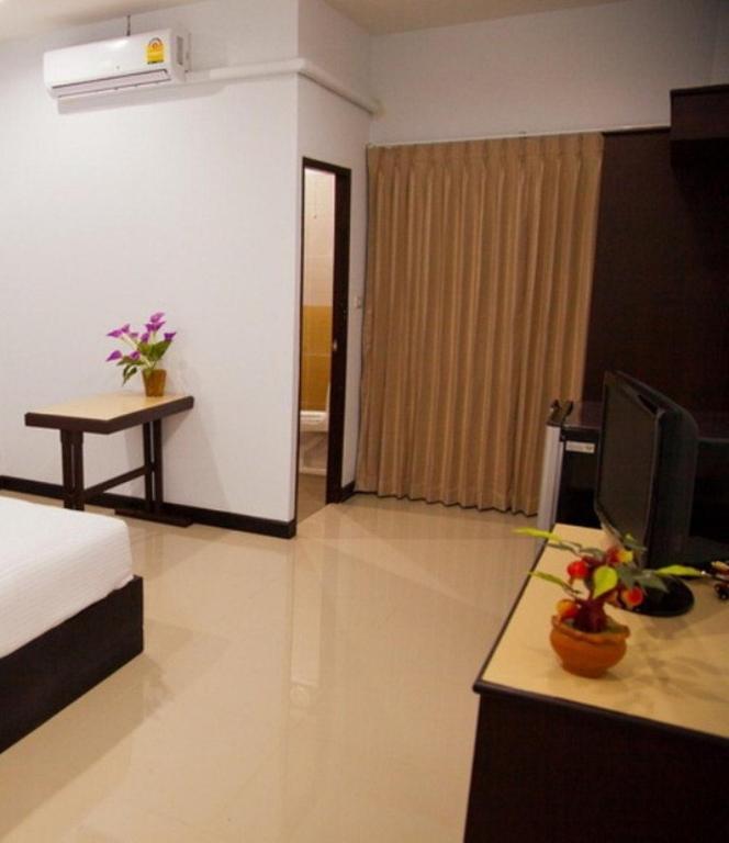 Hotel The Family Grand à Udon Thani Chambre photo