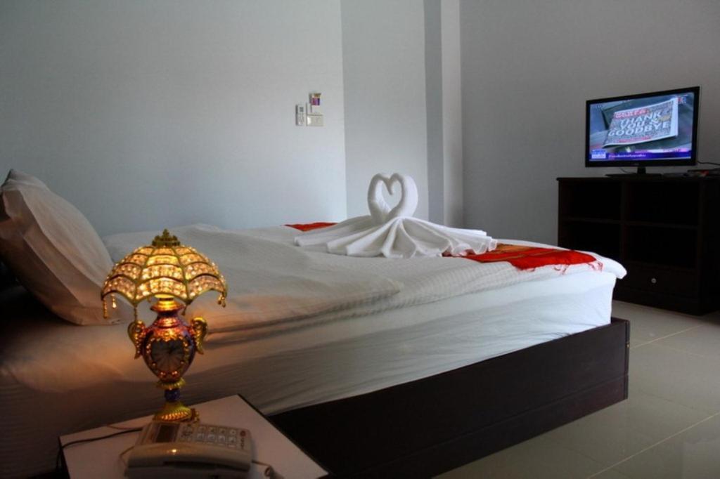 Hotel The Family Grand à Udon Thani Chambre photo